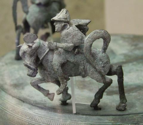 Detail of warrior on top of bronze drum, Dian Culture
